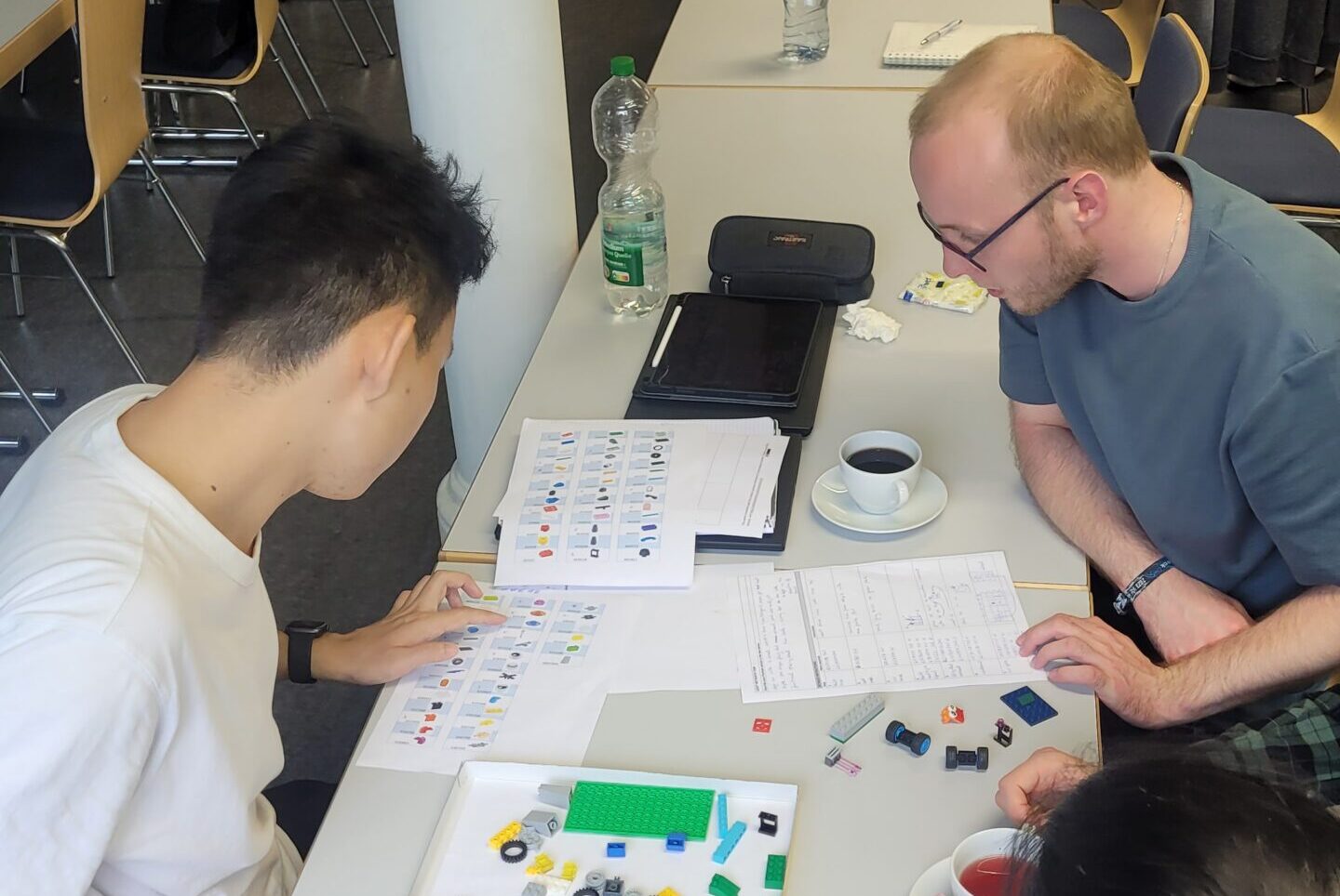 Two male doctoal researchers during the course