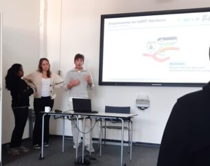 A picture of Apurwa Jagtap, Daniela Wegner and Tomo Jakumeit at the IoBNT meeting in Lübeck