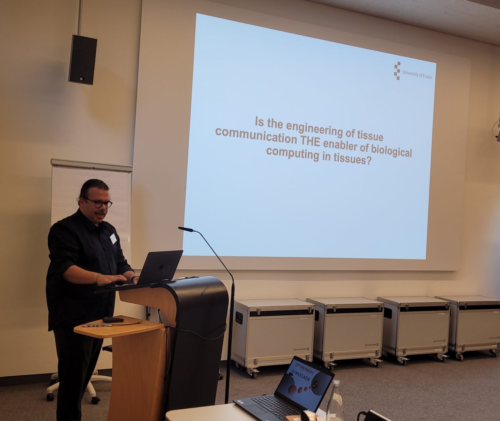 Dr. Michael Taynnan Barros during his presentation at the retreat