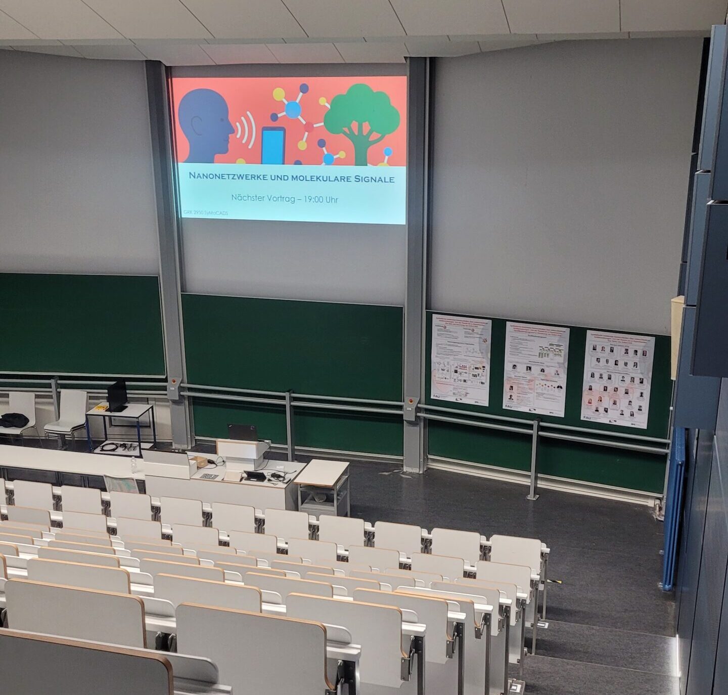 A picture of a lecture hall H5 where SyMoCADS' presentations took place