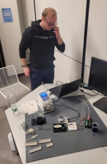 Daniel with the testbed of Cluster 2