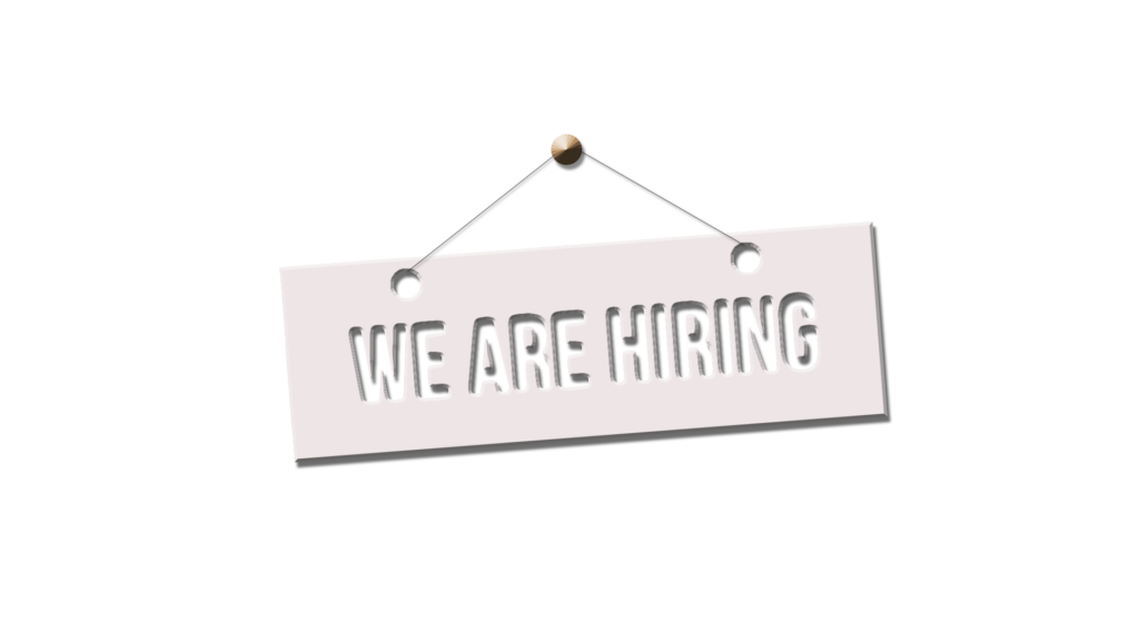 A sign with "We are Hiring"