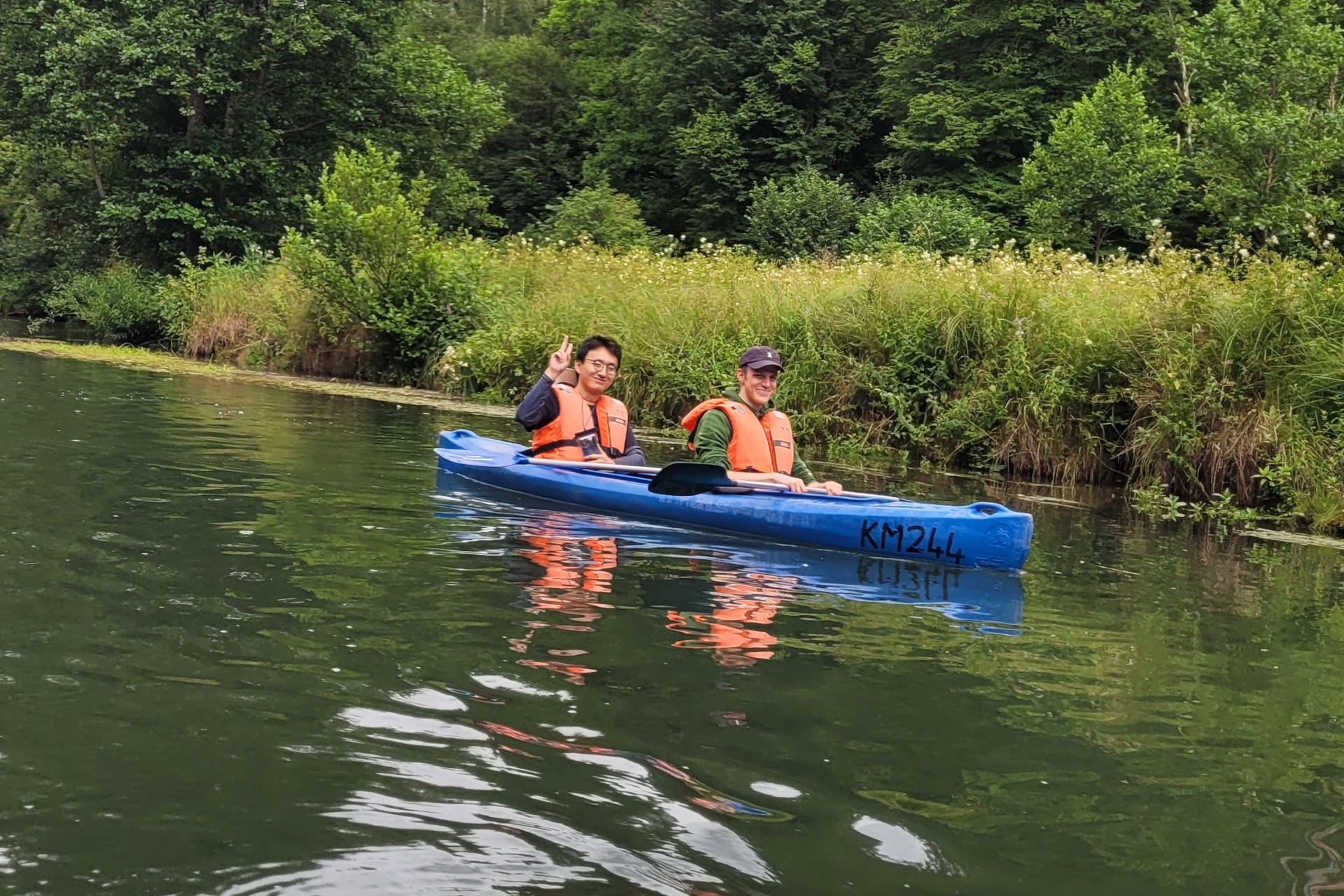 Two males in a kayak