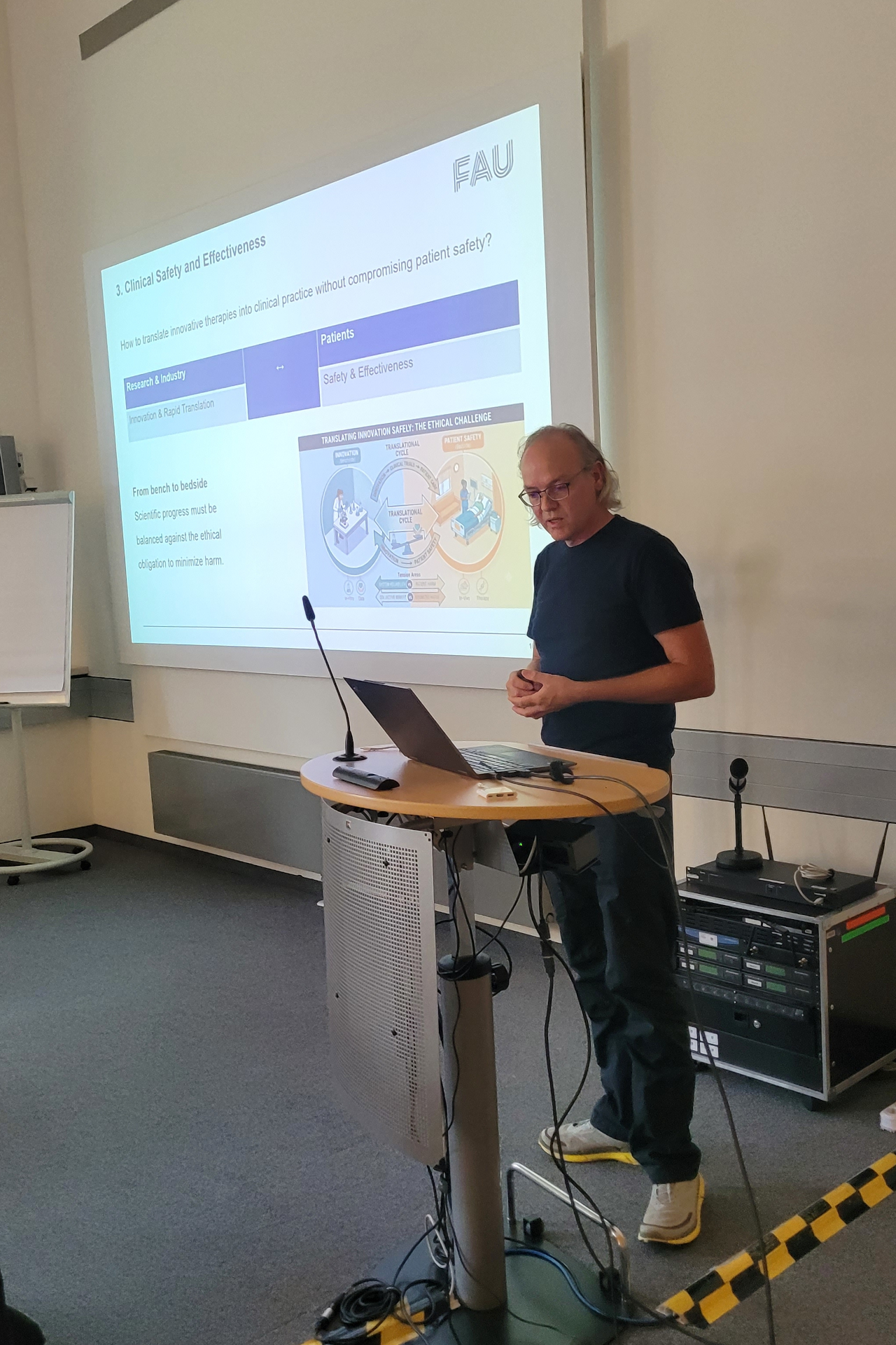 Dr. Sebastian Schuol (male) during his talk
